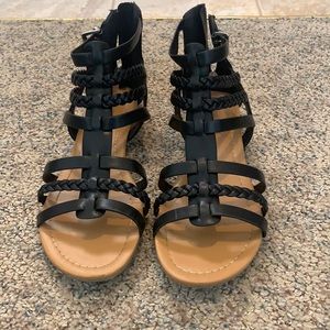 Woman’s black sandals